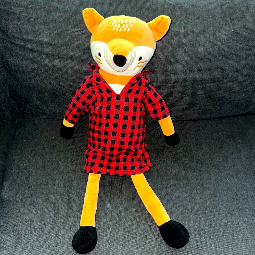Marmalade Theodore Fox Plush Throw Pillow displayed not played with